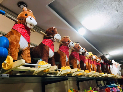 Rocking Horse Plush Ride on Toy with Adjustable Foot Stirrups and Sounds for Toddlers